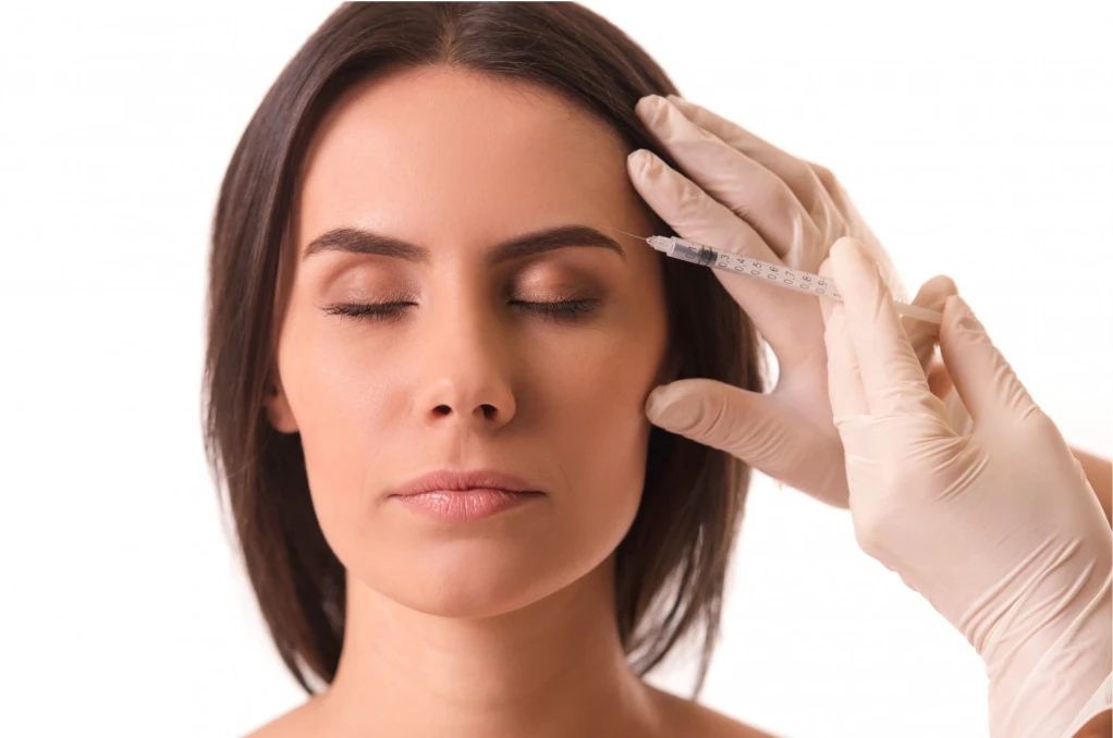 Aplicação de toxina botulínica no terço superior da face